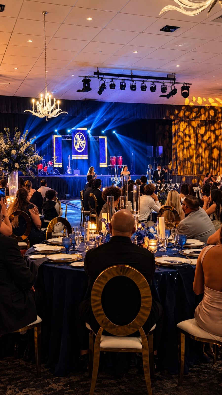Quinceañera celebration with blue stage production