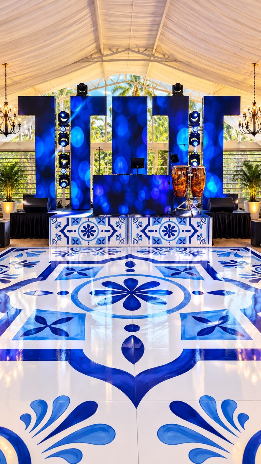 Outdoor tent reception with LED video wall DJ setup