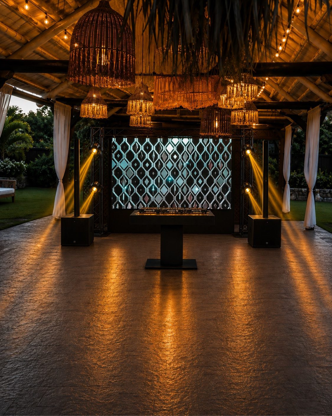 Tropical outdoor venue with LED wall and DJ booth