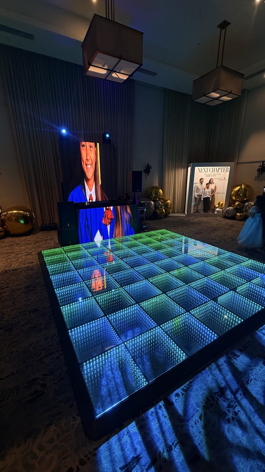 LED dance floor with video tribute at a graduation celebration
