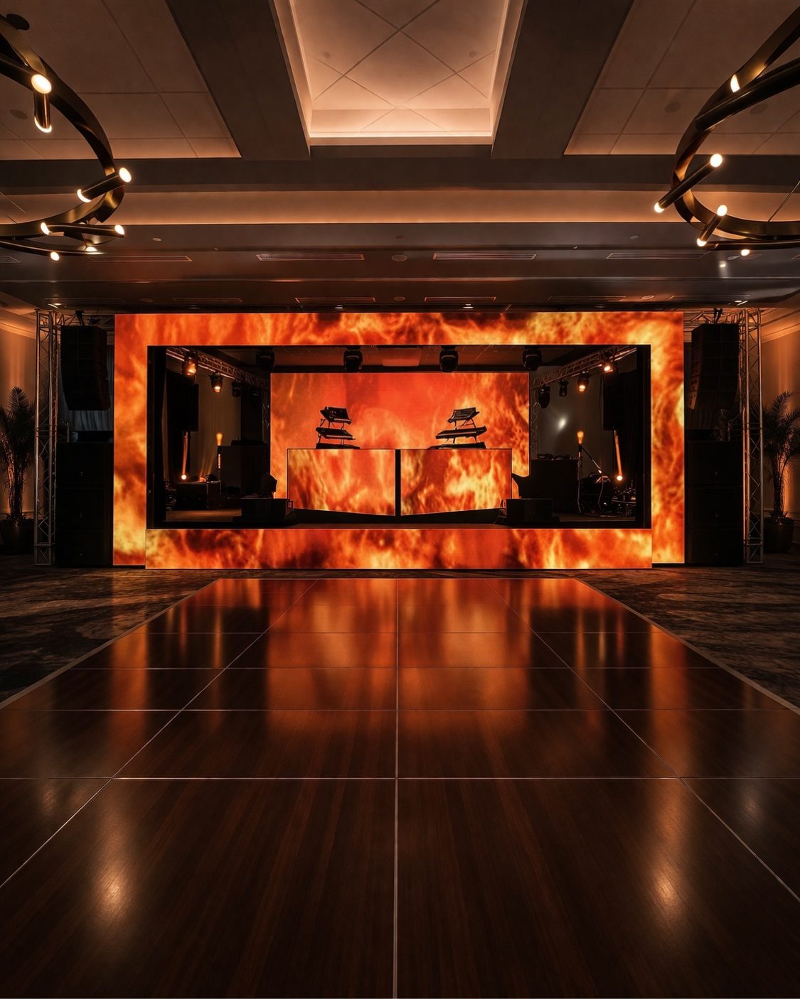 DJ stage with dramatic fire LED wall visuals