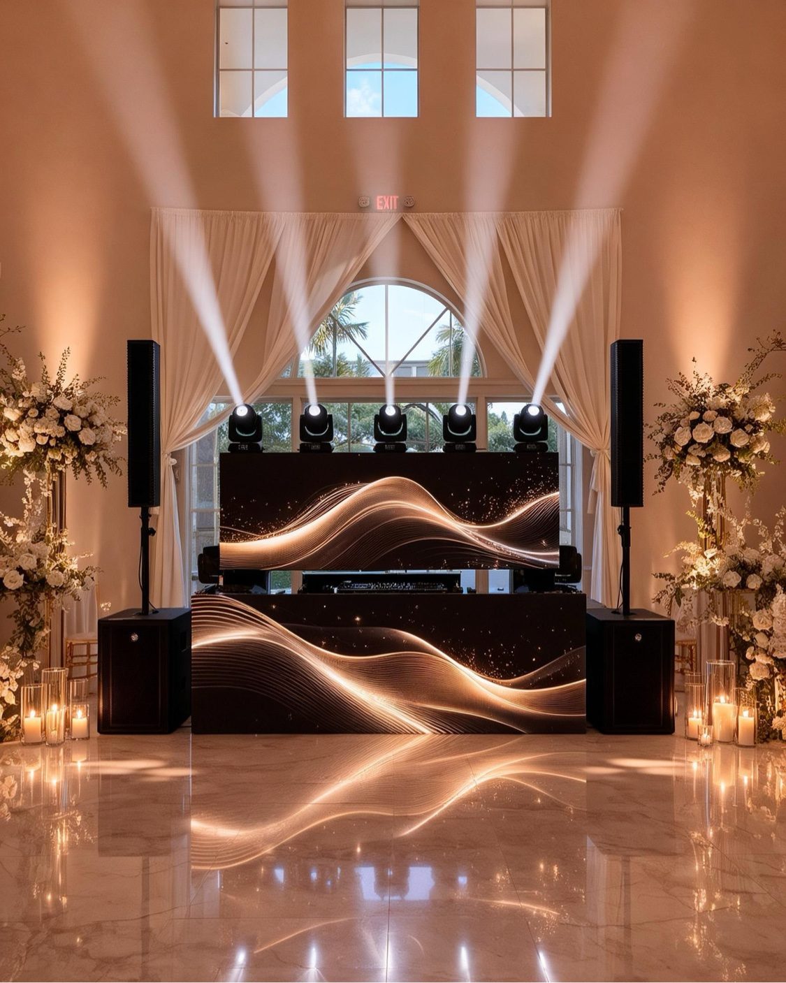 Elegant wedding DJ setup with golden wave LED screens