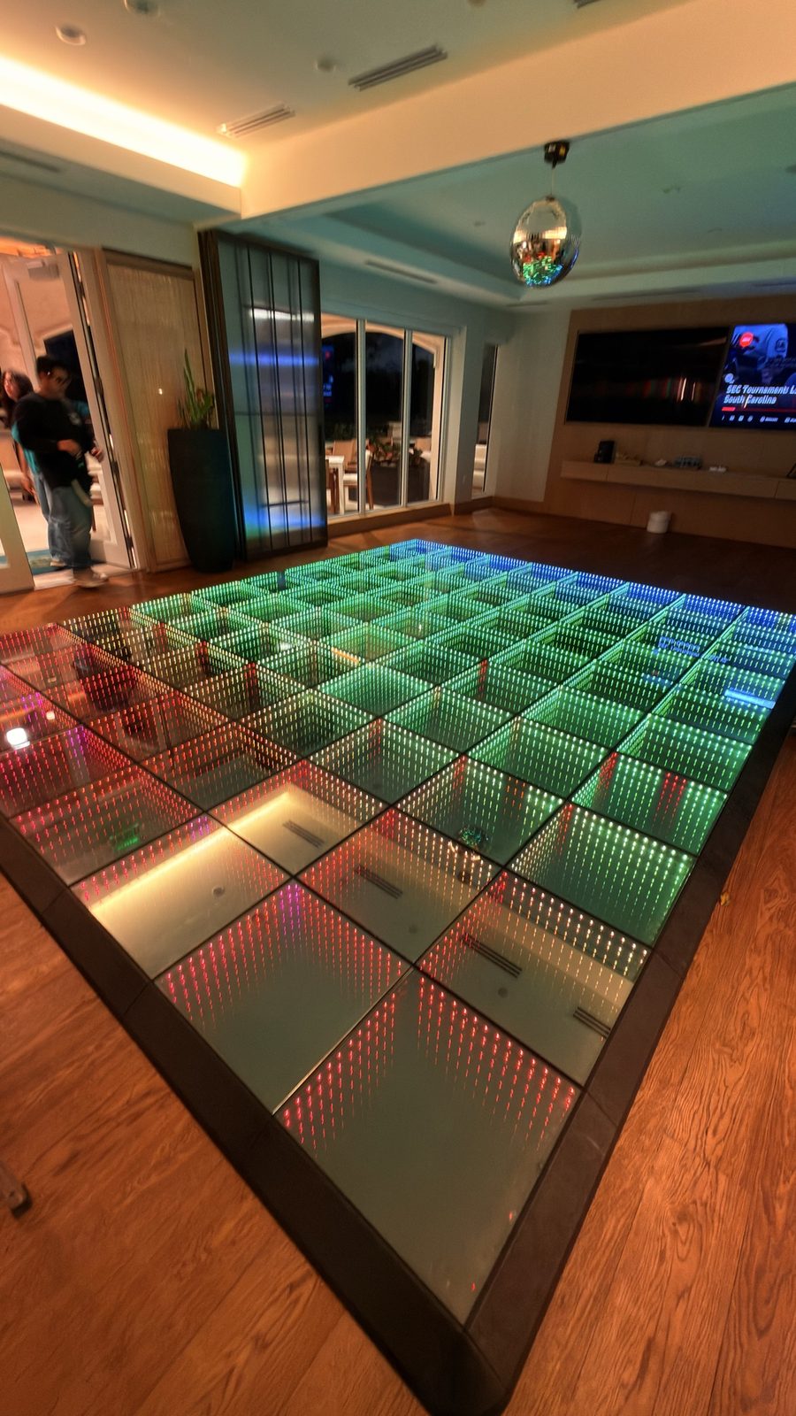 LED infinity dance floor room with disco ball