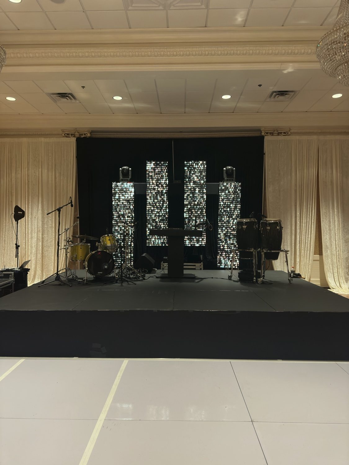 Event stage with LED columns, drums and percussion