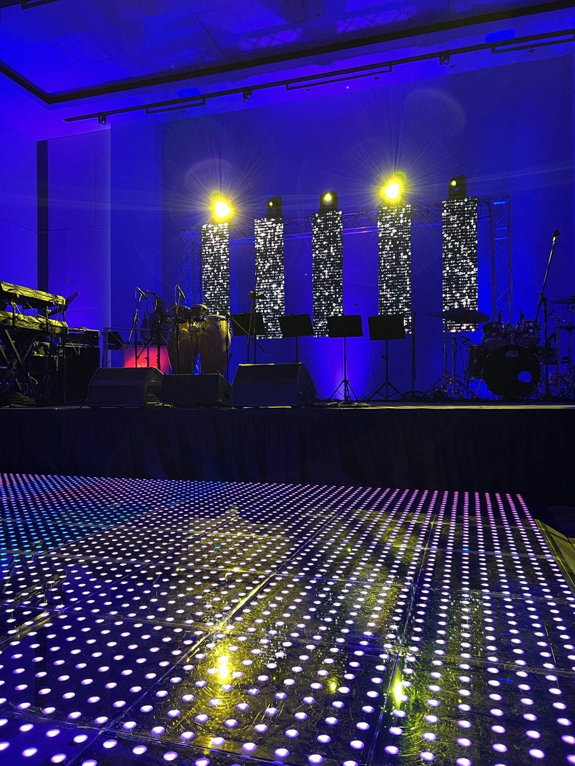 Concert stage with LED columns and LED dance floor