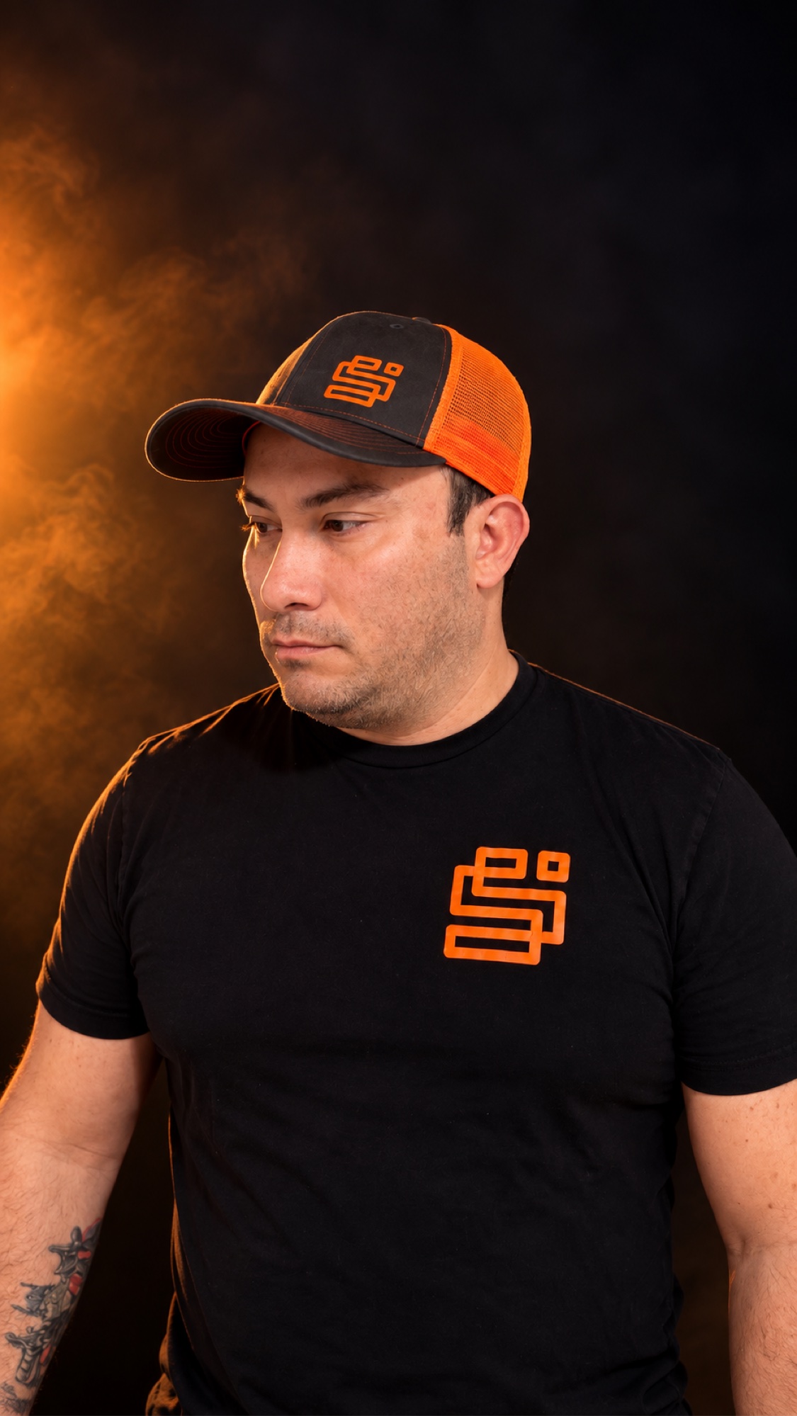 SHINNO in a warm studio portrait